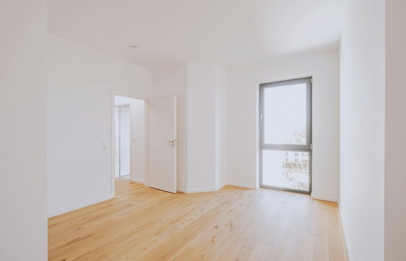 Bodentiefe Fenster und Holzböden in den Wohnungen